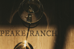Peake Ranch wine barrel glass and bottle